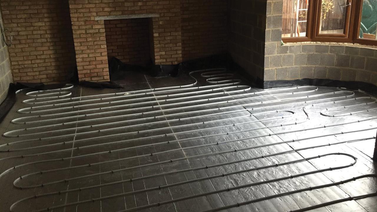 Installing underfloor heating with ceramic tiled flooring image