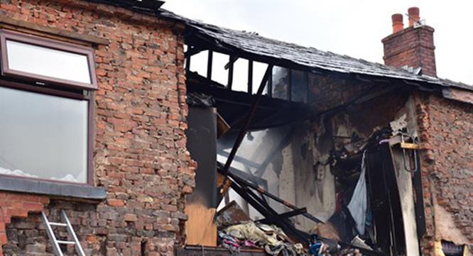 Suspected gas explosion causes house collapse image